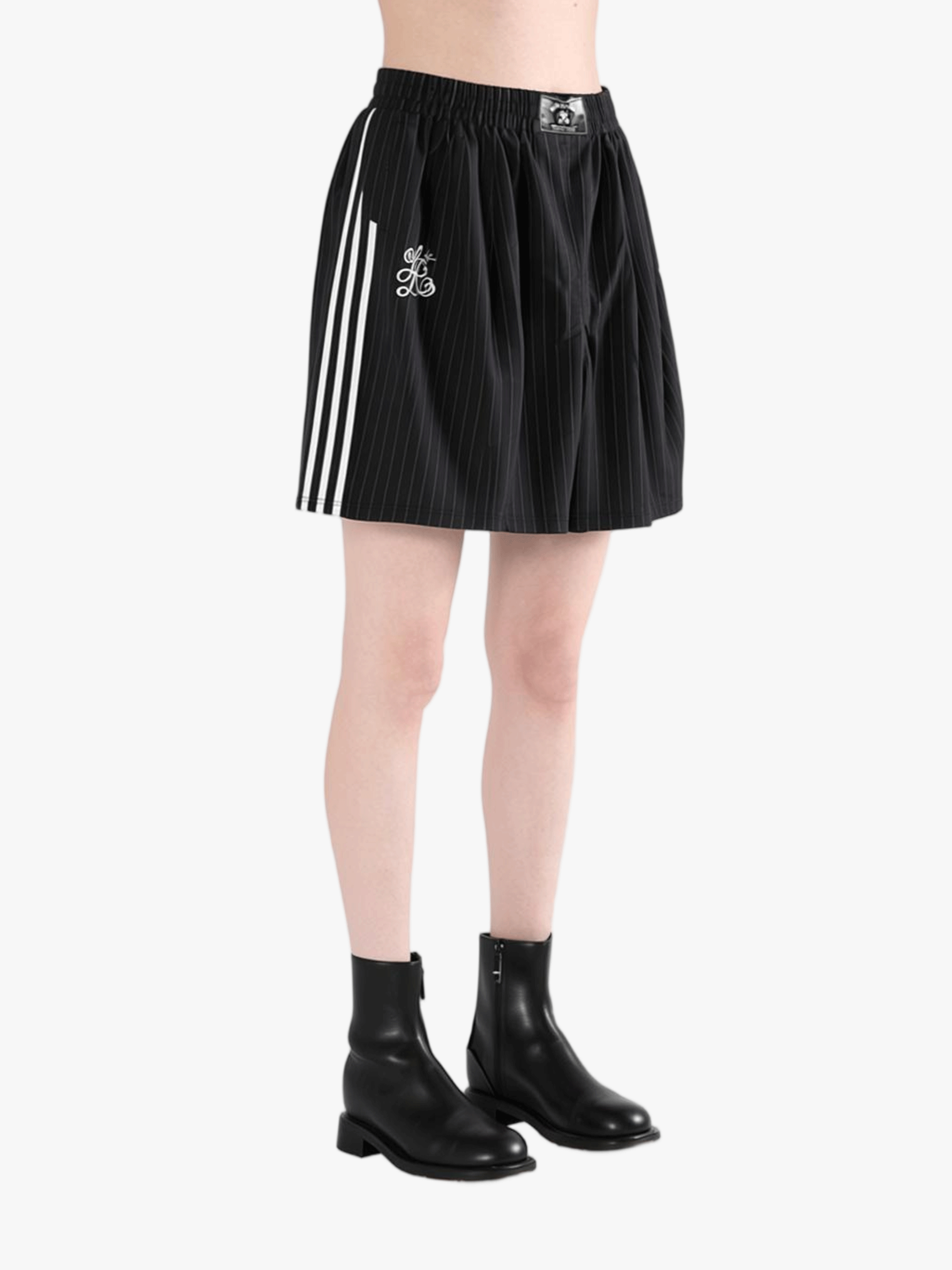 Black short worn by a person, showing the short fit