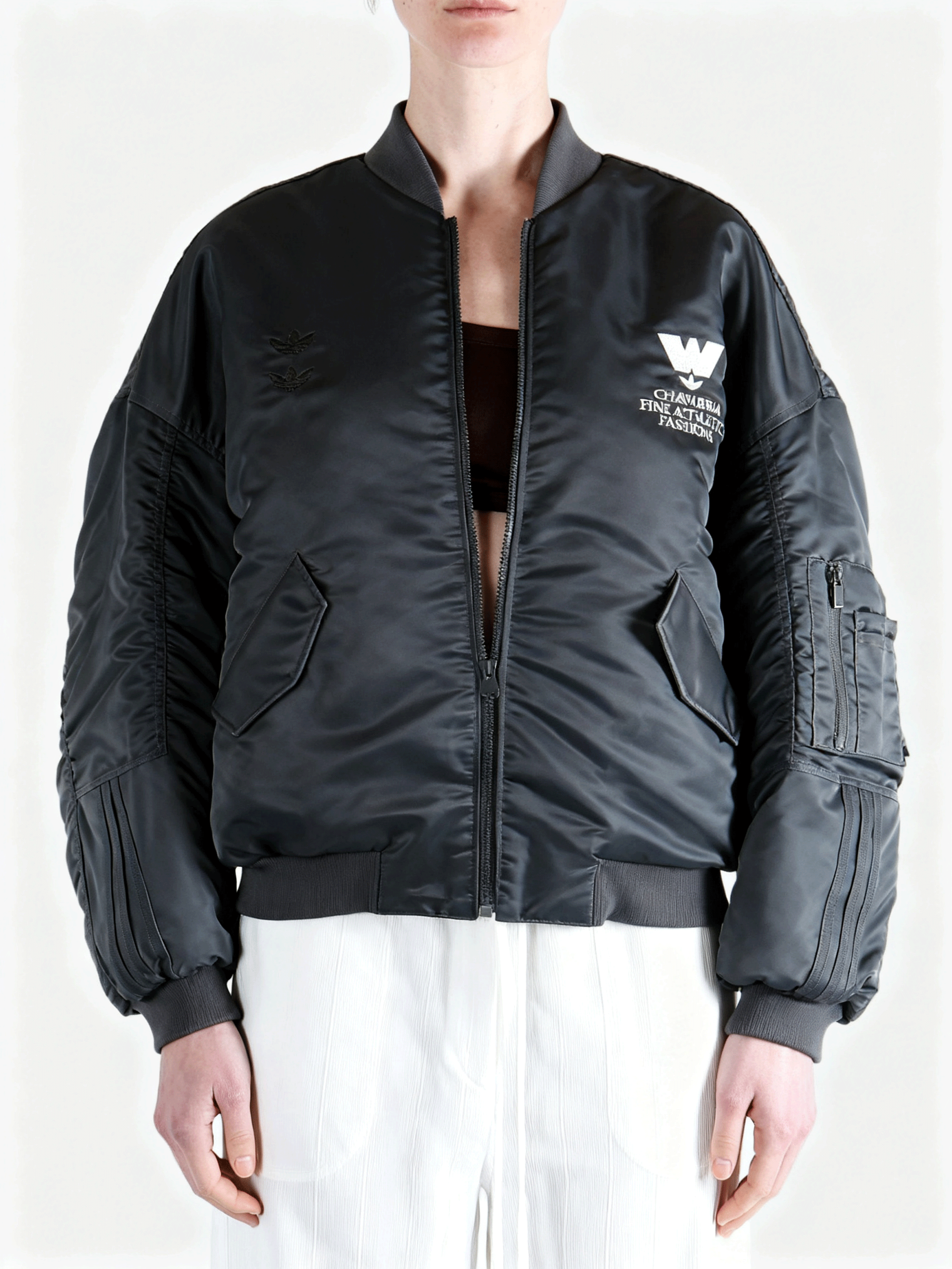 Grey jacket worn by a person, showing the jacket fit