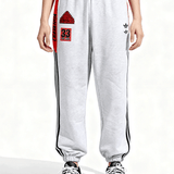 Grey pants worn by a person, showing the pants fit