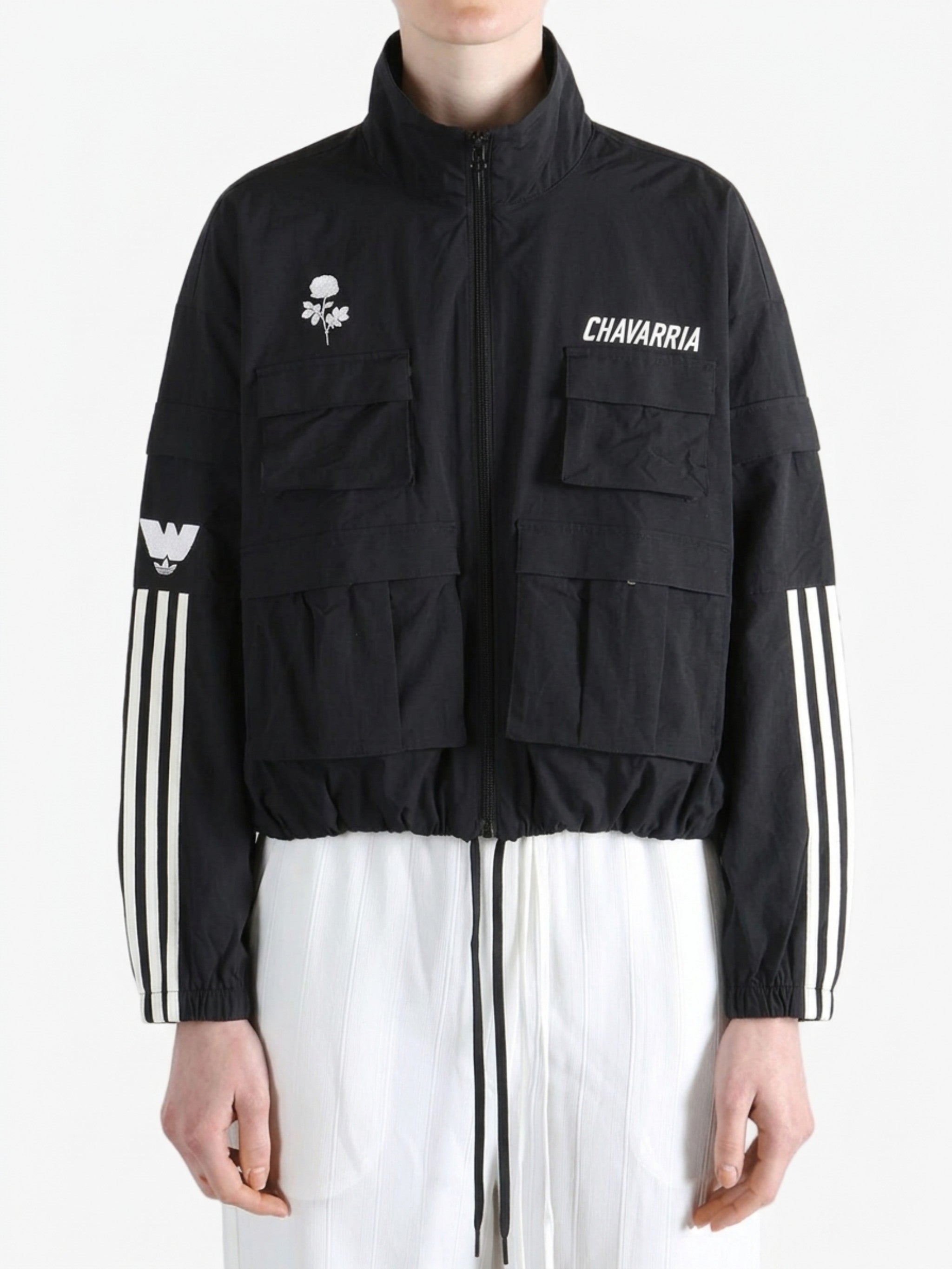 Black jacket worn by a person, showing the jacket fit