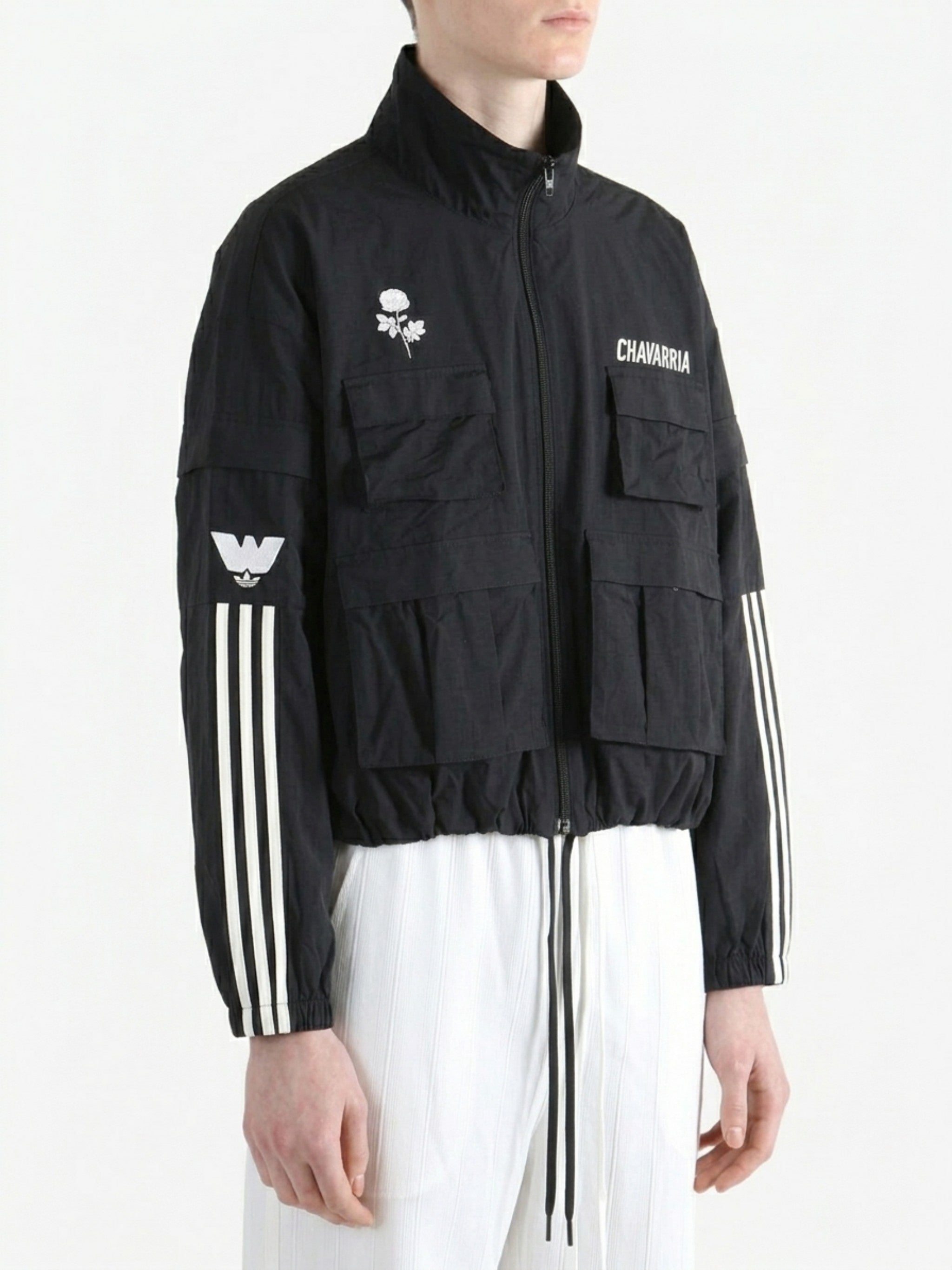 Black jacket worn by a person, side view