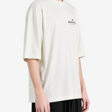 White t-shirt worn by a person, showing the t-shirt fit