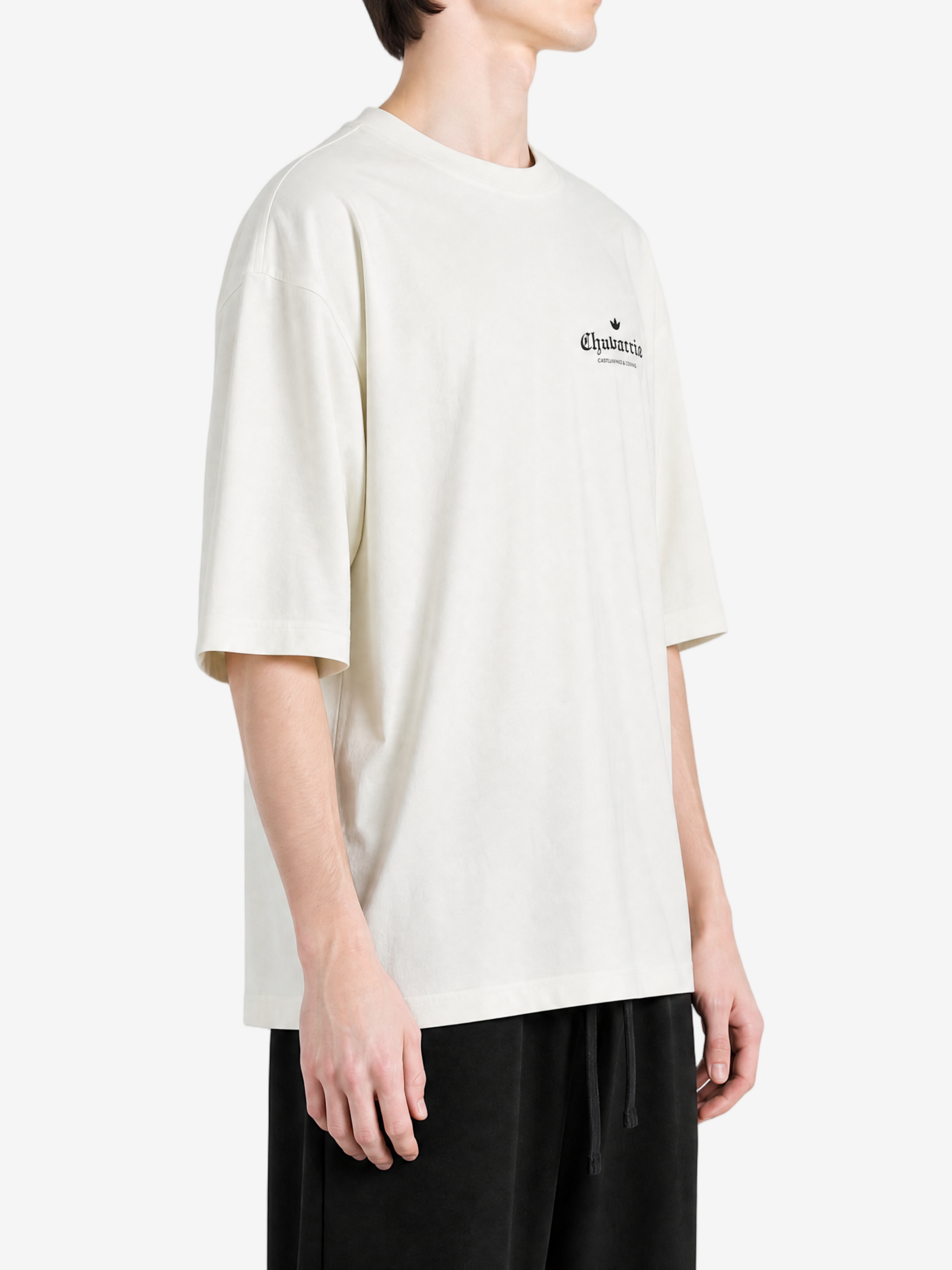 White t-shirt worn by a person, showing the t-shirt fit