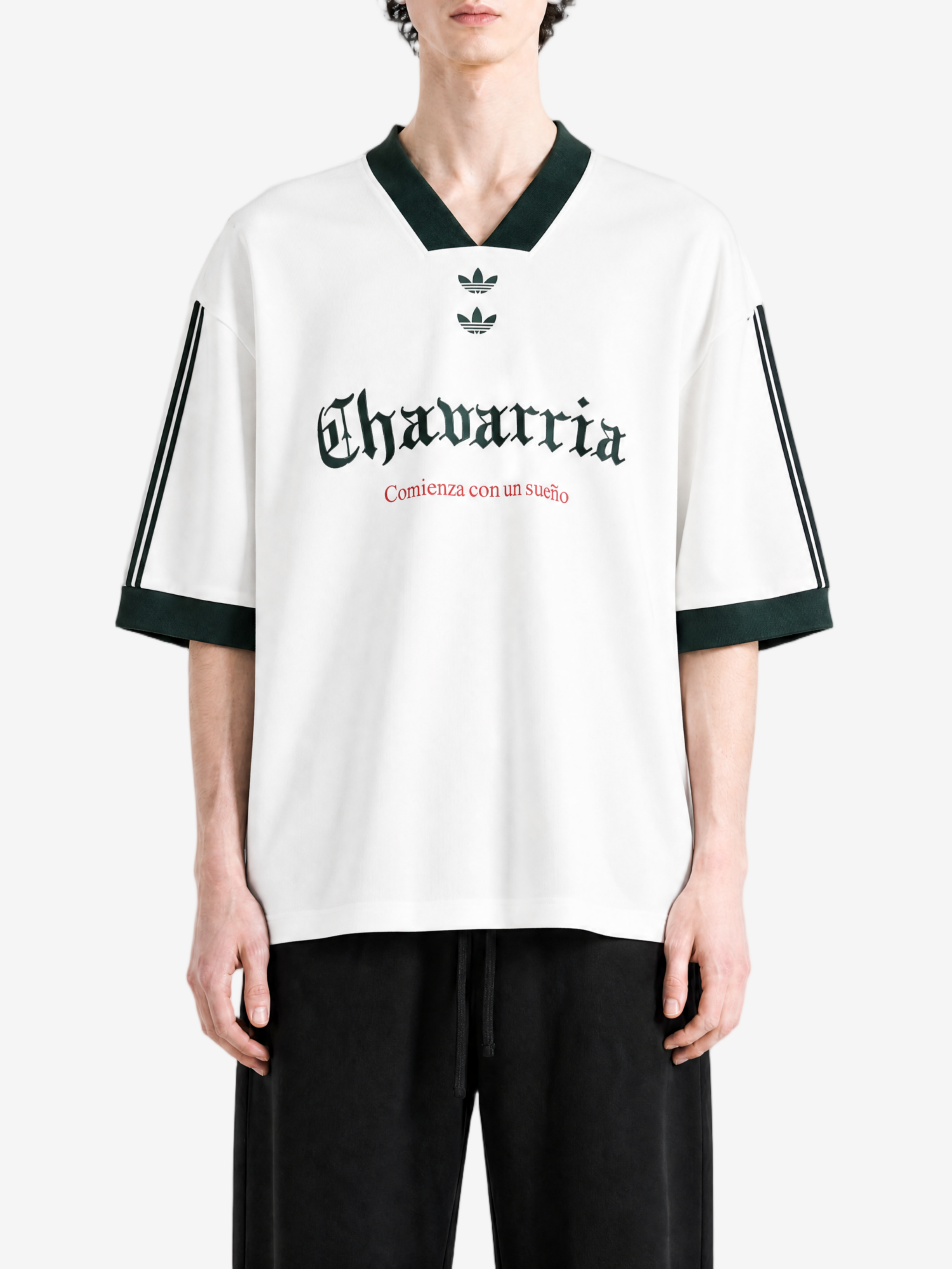 White t-shirt worn by a person, showing the t-shirt fit