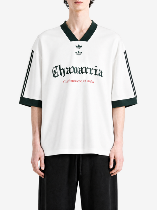 White t-shirt worn by a person, showing the t-shirt fit