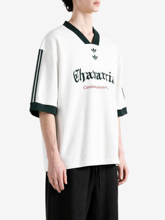 White t-shirt worn by a person, showing the t-shirt fit