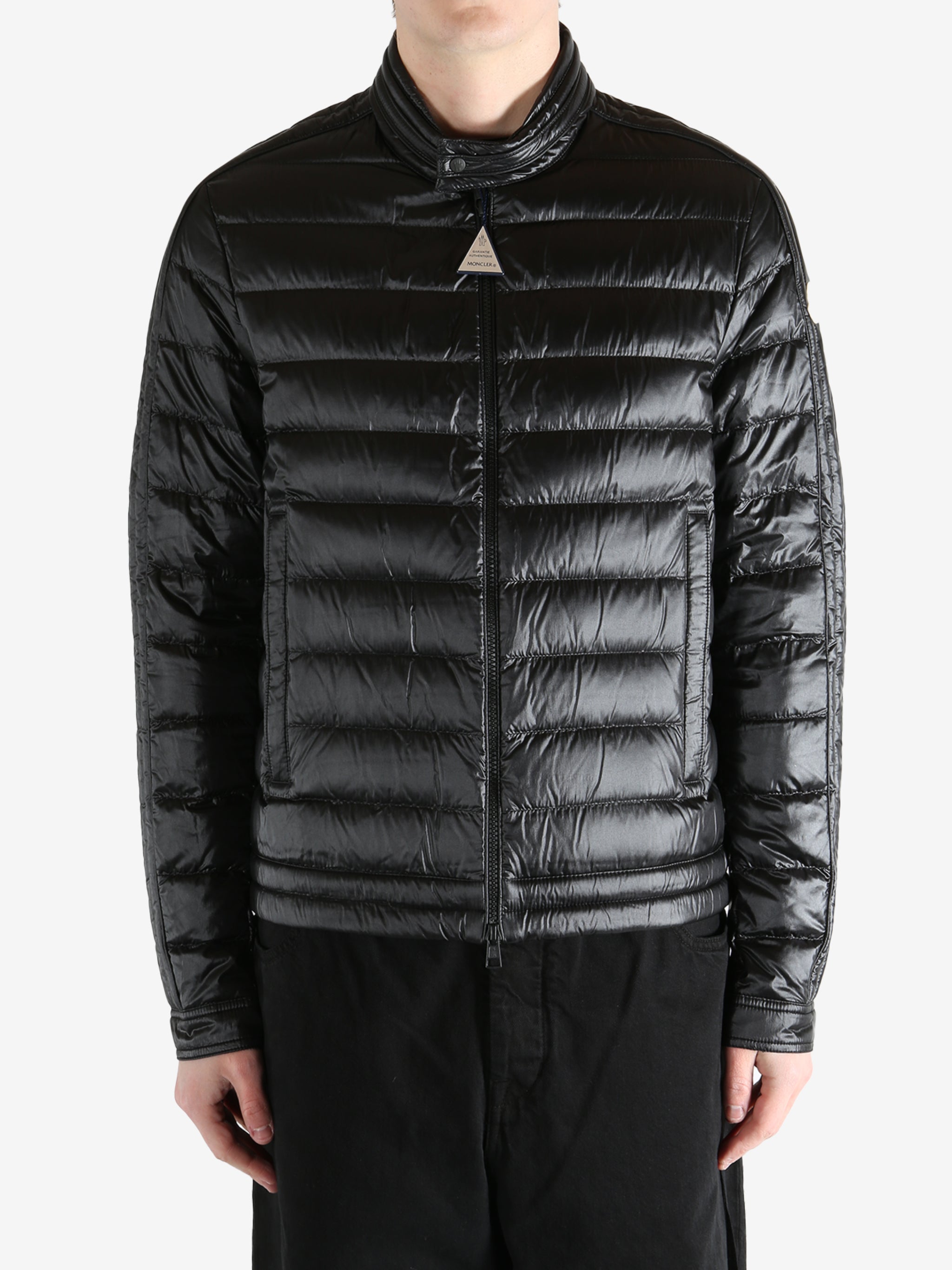 Black Jacket worn by a person, showing the Jacket fit