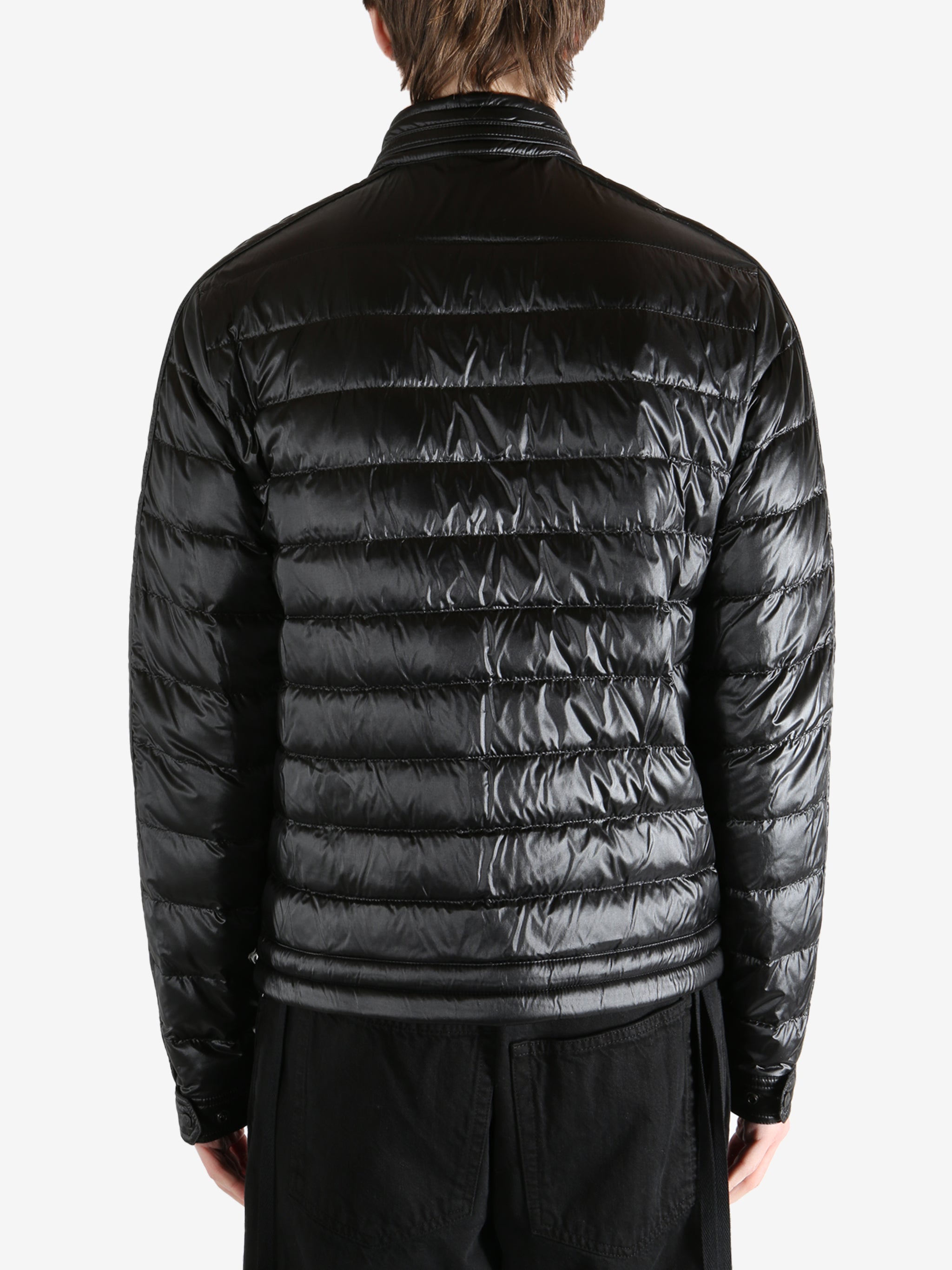 Black Jacket worn by a person, showing the Jacket fit