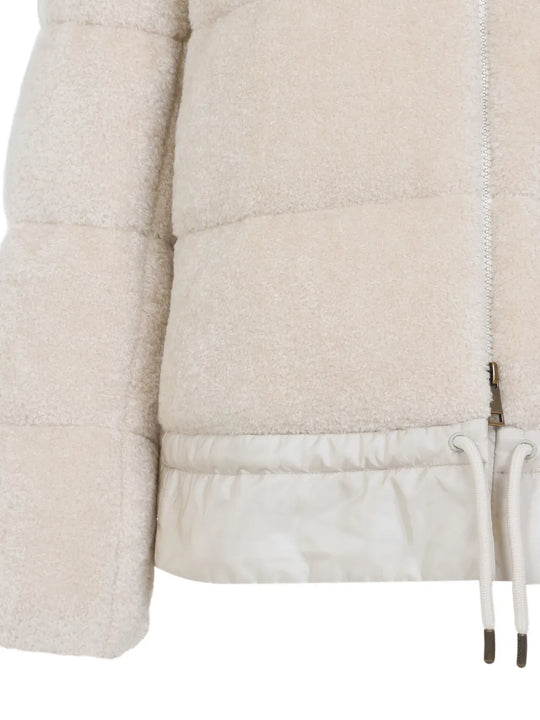 Close up of white jacket,showing texture of the cotton fabric