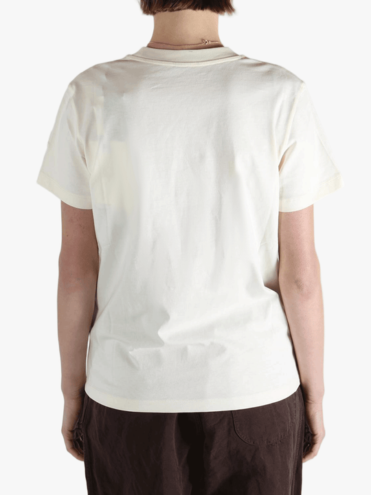 White t-shirt worn by a person, showing the shirt's fit