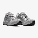 Grey sneakers, side view