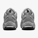 Grey sneakers, back view