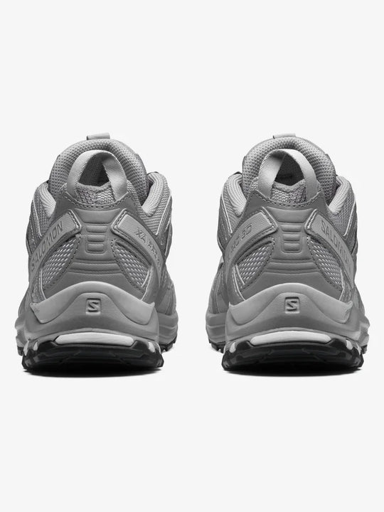 Grey sneakers, back view