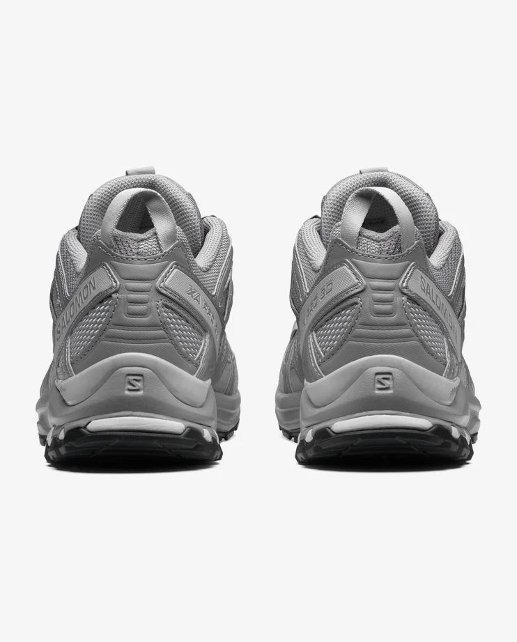 Grey sneakers, back view