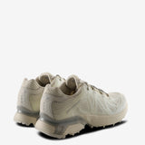 Tan sneakers, back view