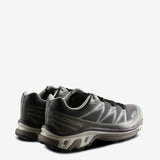 Grey sneakers, back view