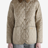 Quilted jacket worn by a person, showing the jacket fit