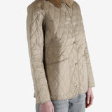 Quilted jacket worn by a person, showing the jacket fit