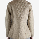 Quilted jacket worn by a person, showing the jacket fit
