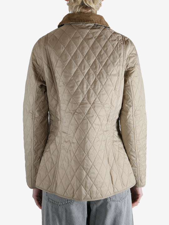 Quilted jacket worn by a person, showing the jacket fit