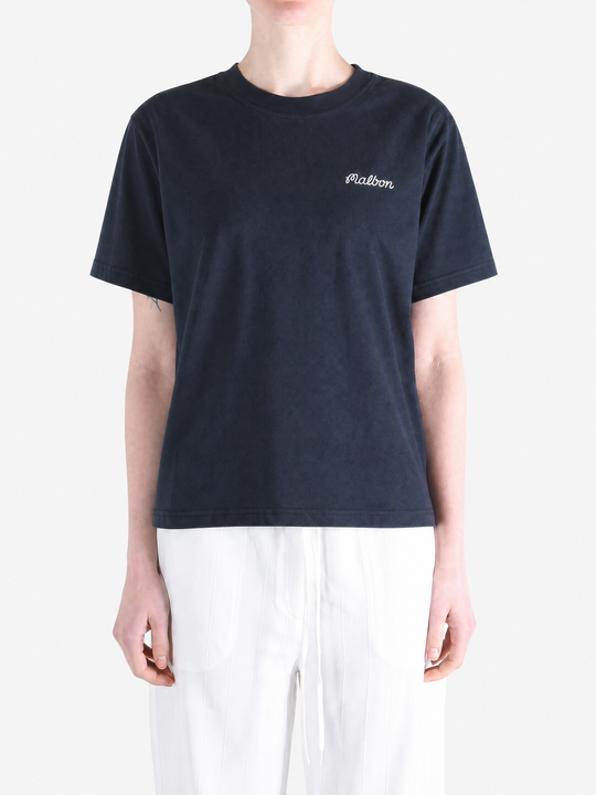 Navy t-shirt worn by a person, showing the t-shirt's fit.