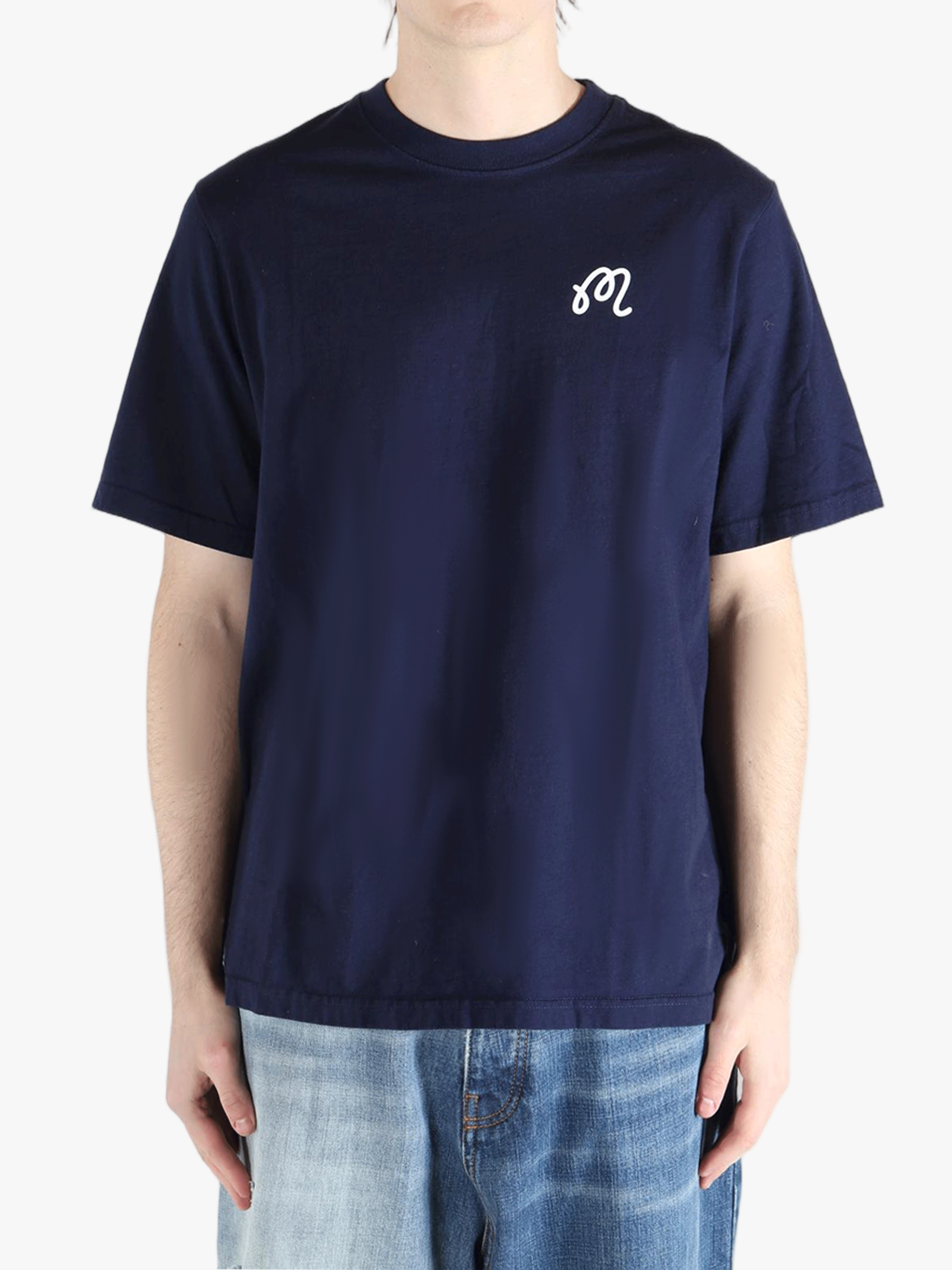 Navy t-shirt worn by a person, showing the shirt's fit