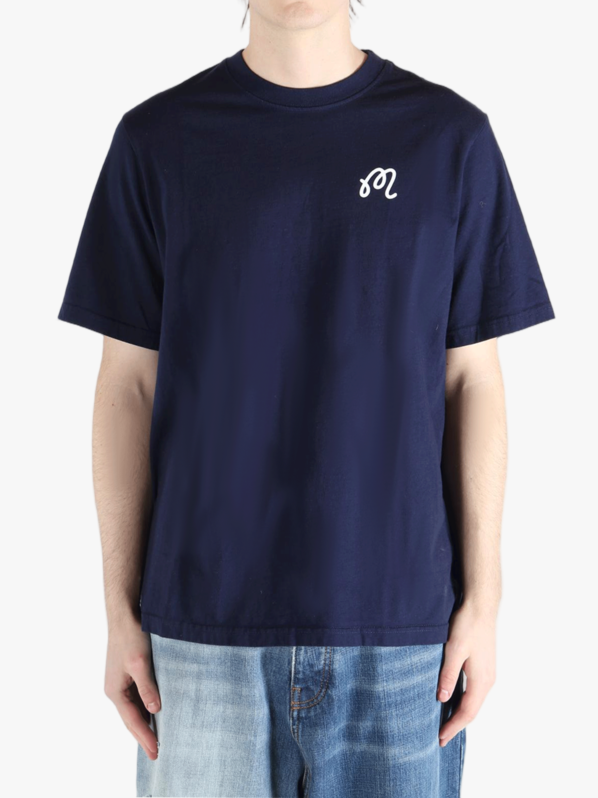 Navy t-shirt worn by a person, showing the shirt's fit