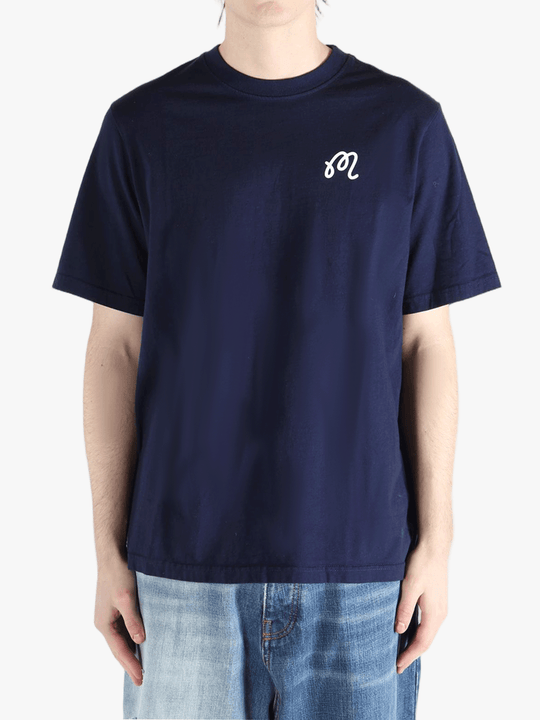 Navy t-shirt worn by a person, showing the shirt's fit