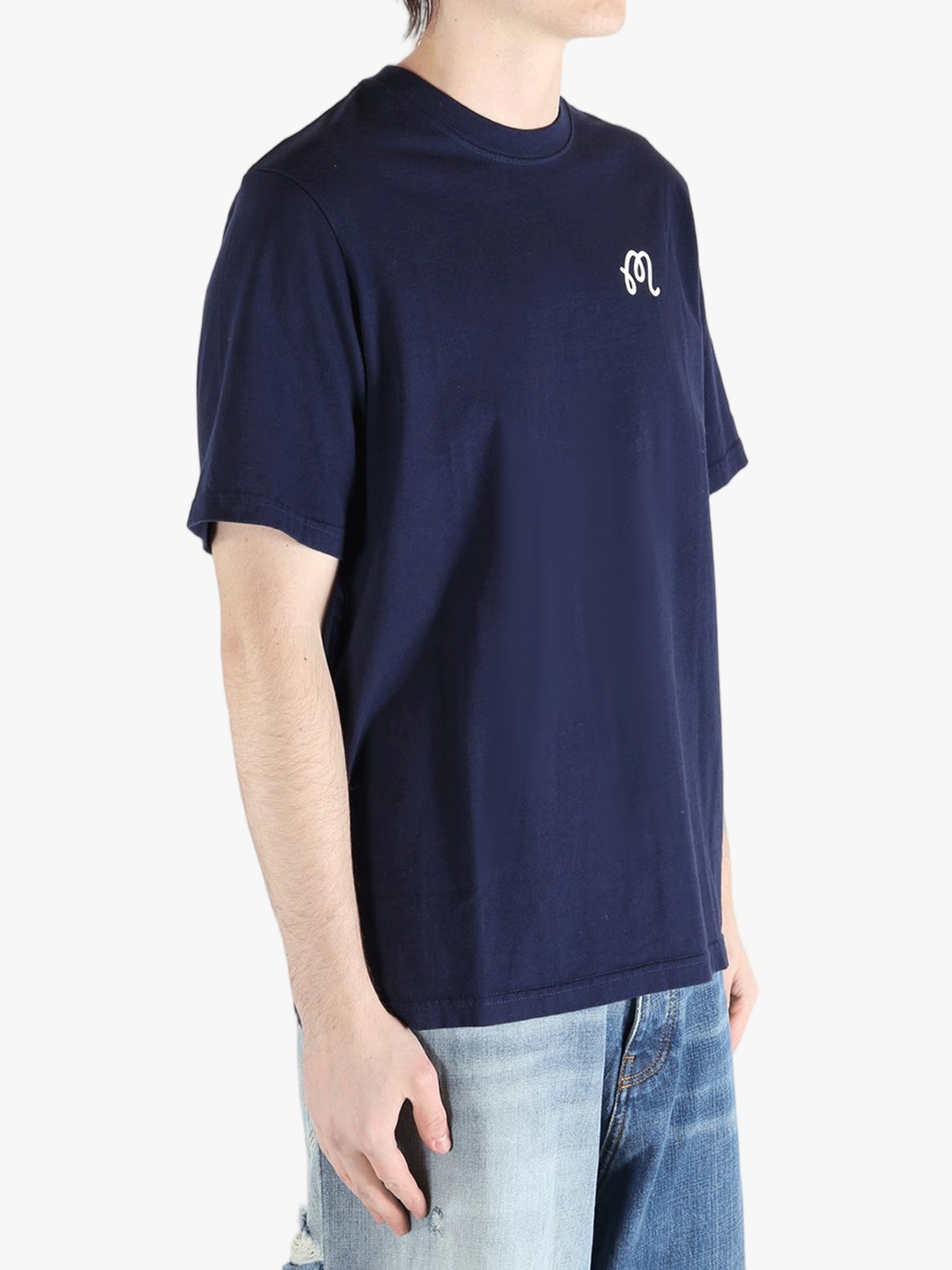 Navy t-shirt worn by a person, showing the shirt's fit