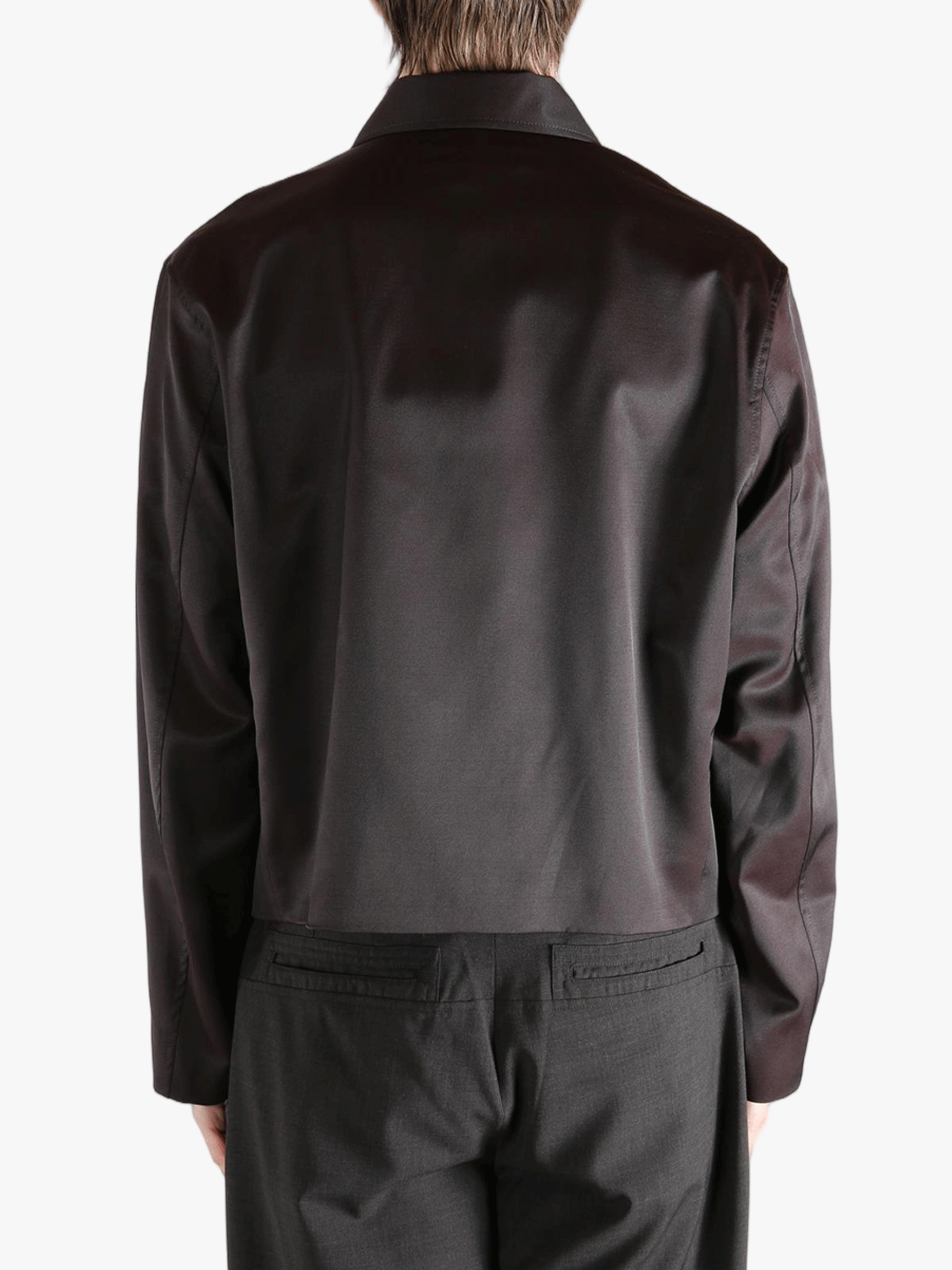 Brown jacket worn by a person, showing the jacket fit