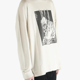 White sweatshirt worn by a person, showing the sweatshirt's fit