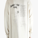 White sweatshirt worn by a person, showing the sweatshirt's fit