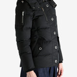 Black jacket worn by a person, showing the jacket's fit