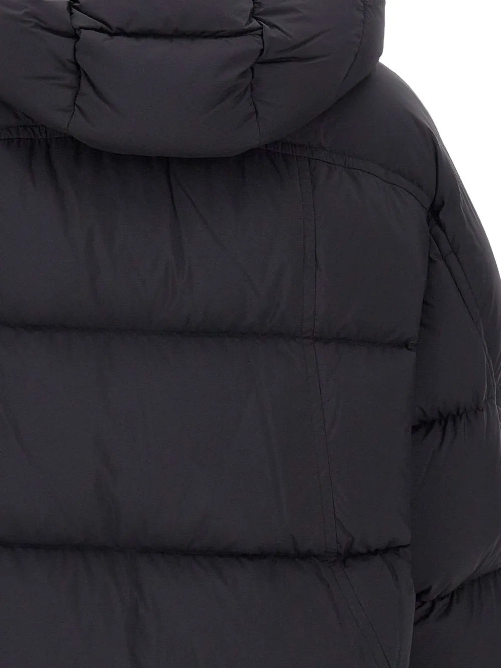 Close up of black coat,showing texture of the nylon fabric.