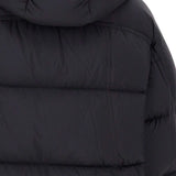 Close up of black coat,showing texture of the nylon fabric.