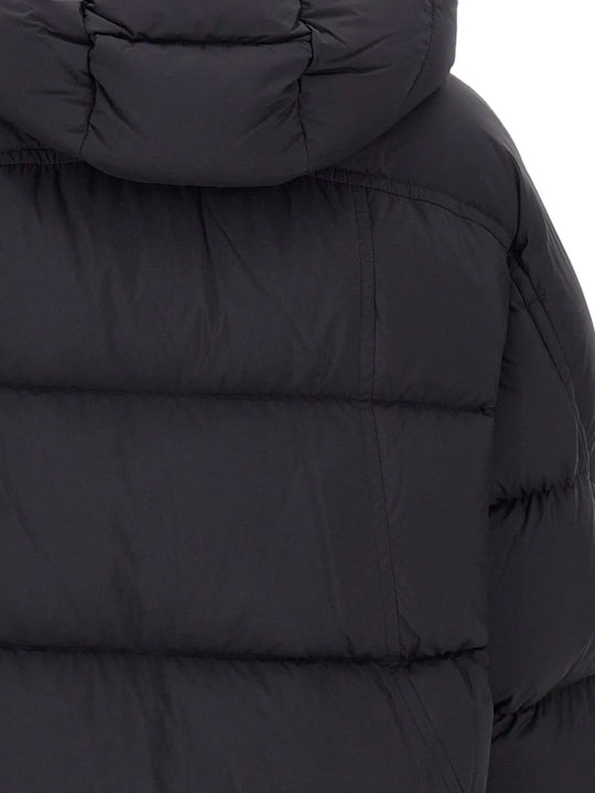 Close up of black coat,showing texture of the nylon fabric.
