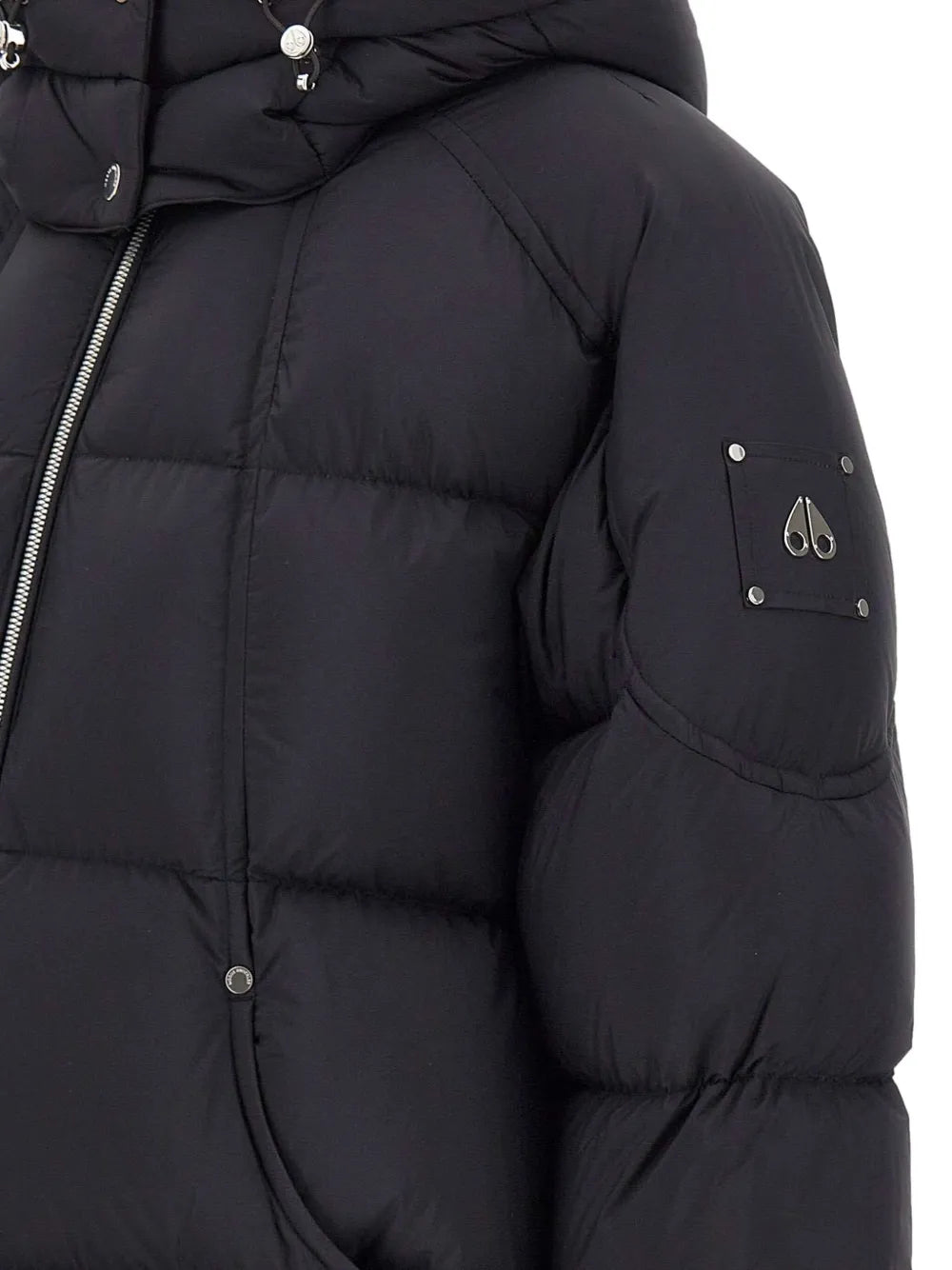 Close up of black coat,showing texture of the nylon fabric.