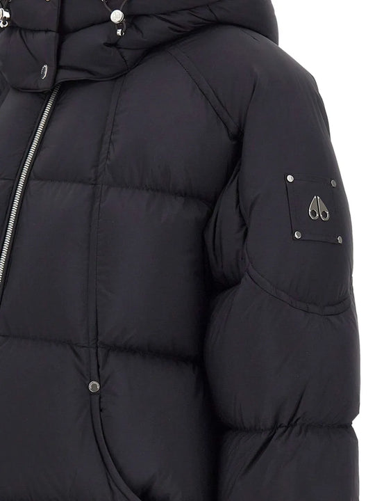 Close up of black coat,showing texture of the nylon fabric.