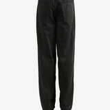 Black pants worn by a person, showing the pants's fit