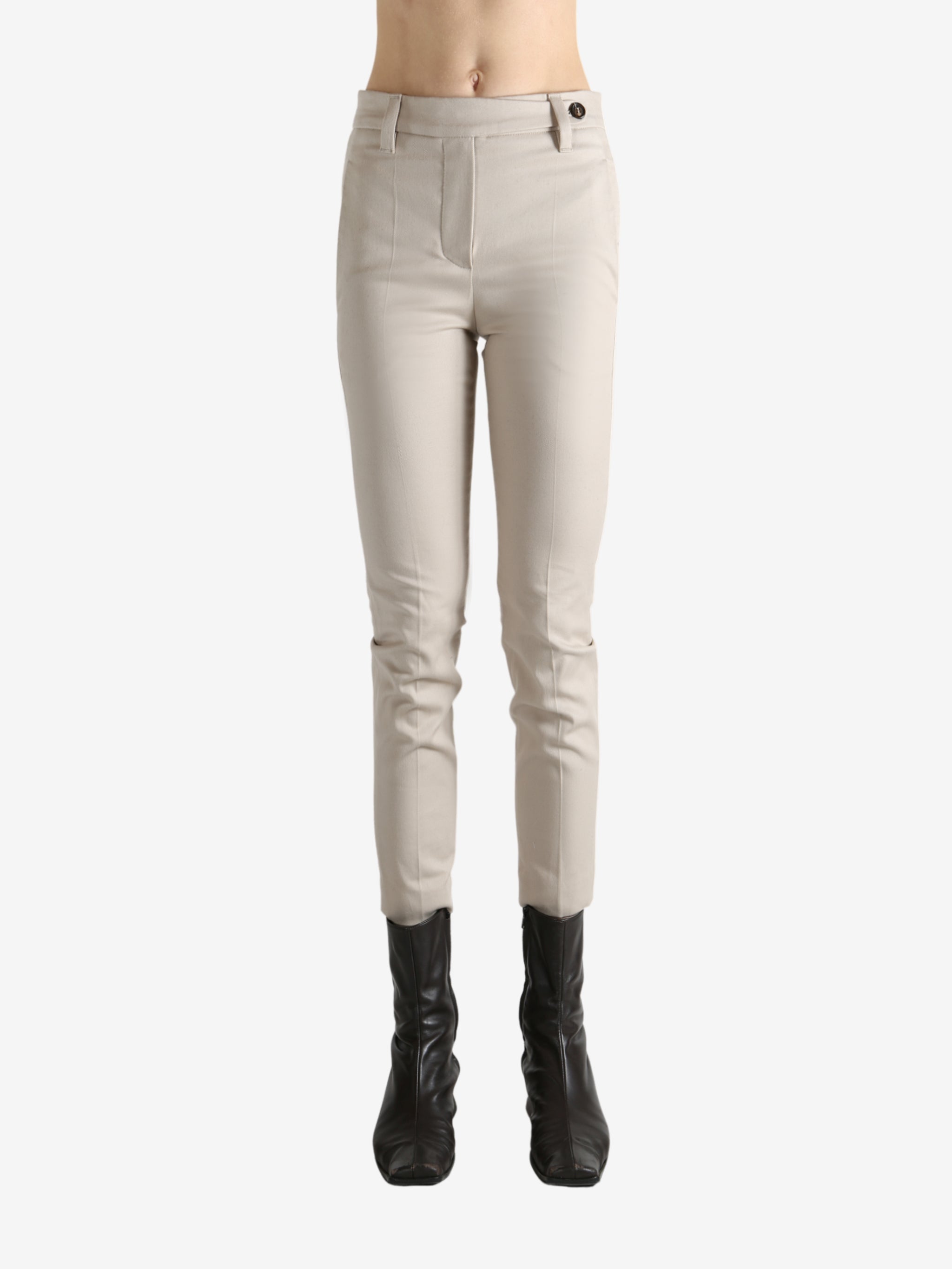 Tan pants worn by a person, showing the pants' fit