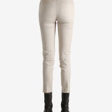 Tan pants worn by a person, showing the pants' fit