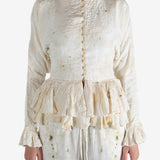 White tops worn by a person, showing the tops's fit