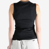 Black top worn by a person, showing the top's fit