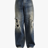 blue jeans worn by a person, showing the  jeans fit