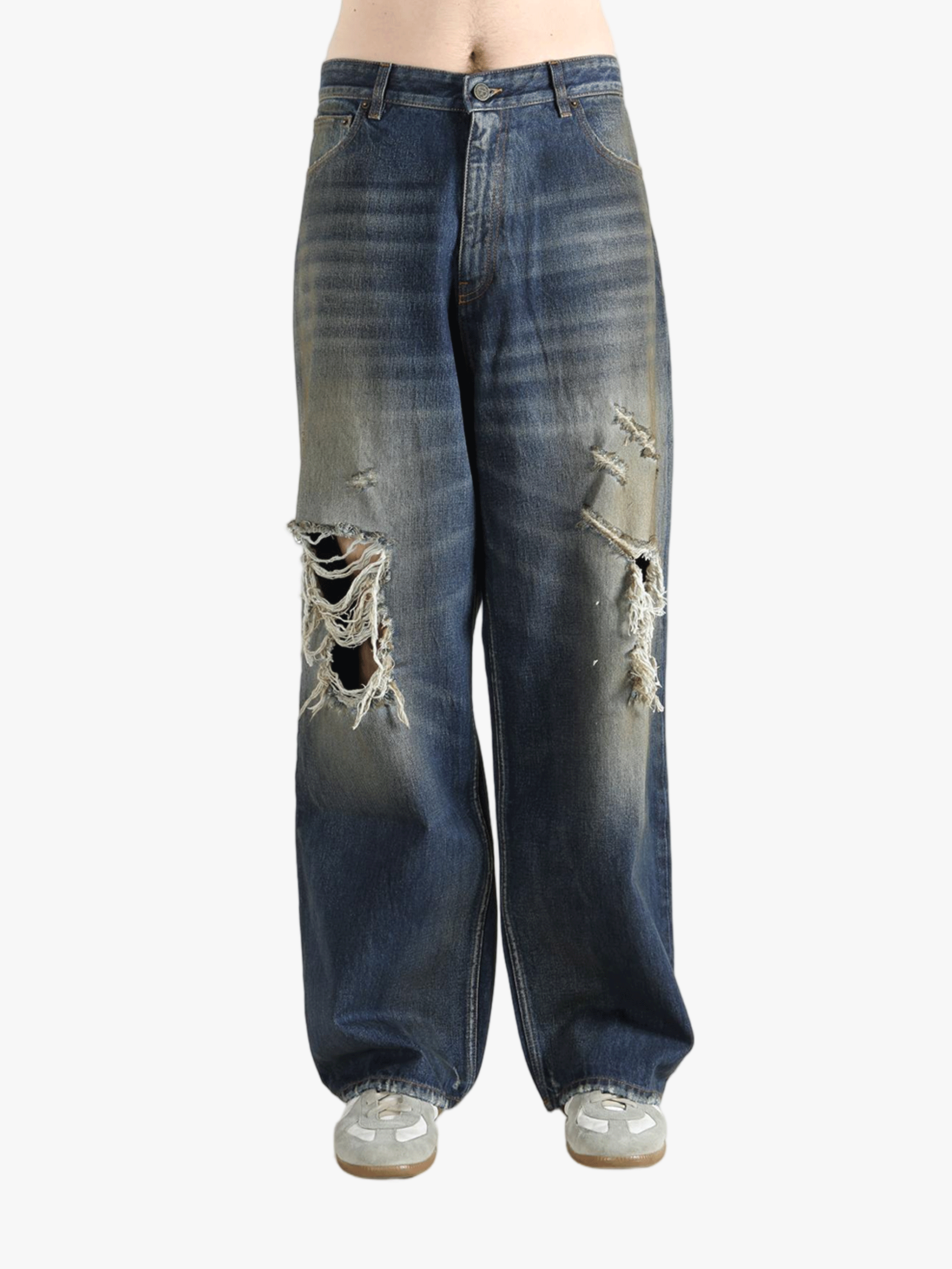 blue jeans worn by a person, showing the  jeans fit