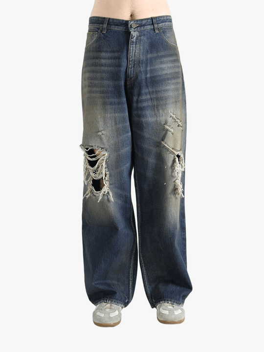 blue jeans worn by a person, showing the  jeans fit