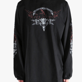 Black shirt worn by a person, showing the  shirt fit