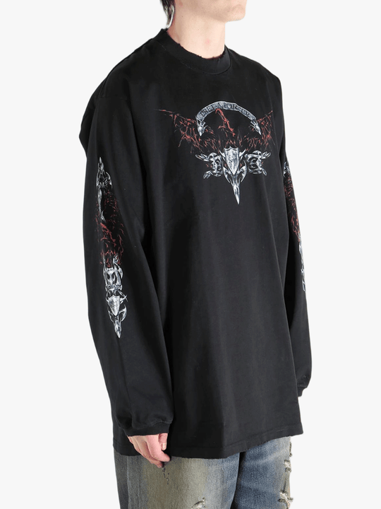 Black shirt worn by a person, showing the  shirt fit