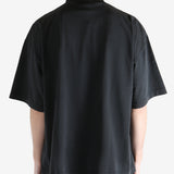 Blcak T-shirt worn by a person, showing the T-shirt fit