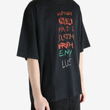 Black T-shirt worn by a person, showing the shirt fit